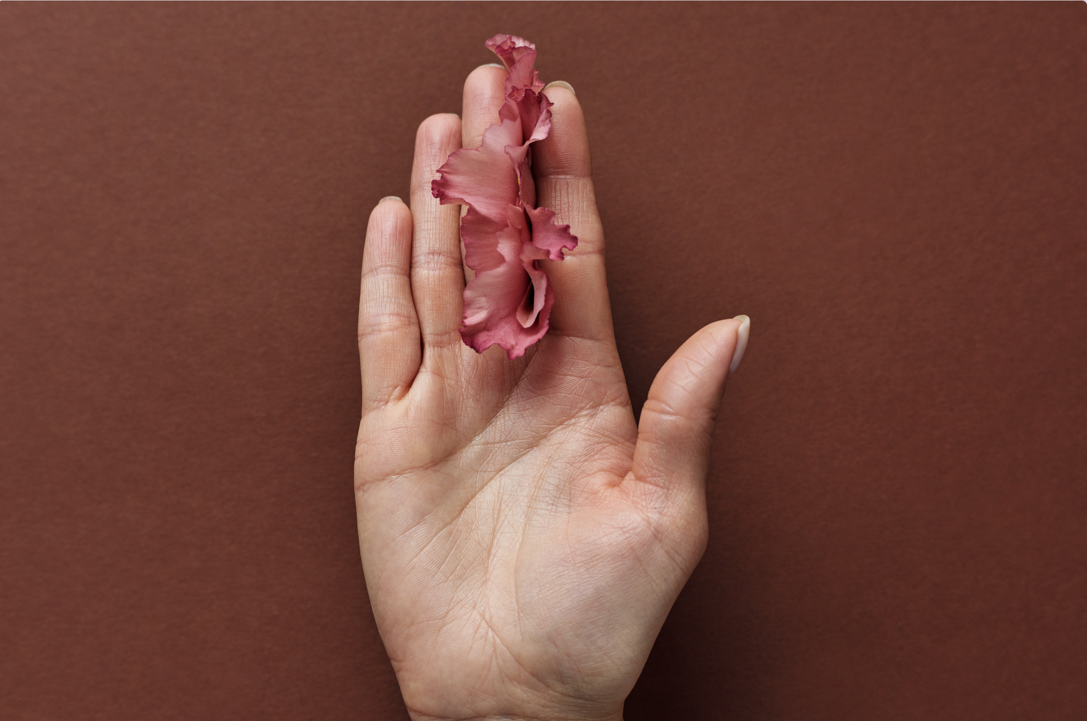 womans hand flower